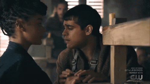 A Man And A Woman Are Kissing In A Scene From Dc 'S Legends GIF