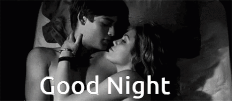 A Man And A Woman Are Kissing In Bed With The Words `` Good Night '' Written Above Them . GIF