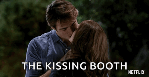A Man And A Woman Are Kissing In The Kissing Booth Netflix Movie . GIF