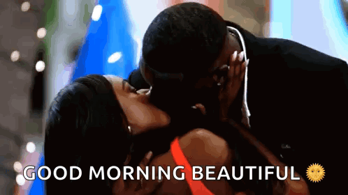 A Man And A Woman Are Kissing With The Words `` Good Morning Beautiful '' Below Them . GIF