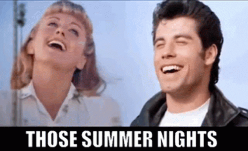 A Man And A Woman Are Laughing Together In A Movie . GIF