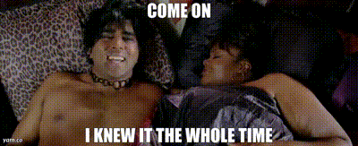 a man and a woman are laying on a bed with the words come on i knew it the whole time above them