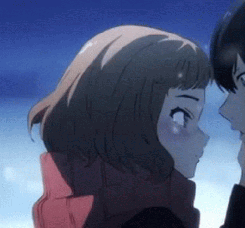 A Man And A Woman Are Looking At Each Other . GIF