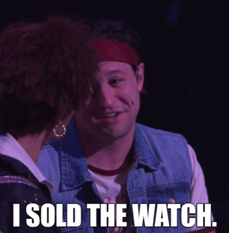 A Man And A Woman Are Looking At Each Other And The Man Is Saying I Sold The Watch GIF