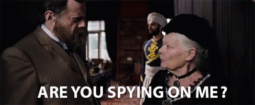 a man and a woman are looking at each other and the woman is asking the man if he is spying on her .