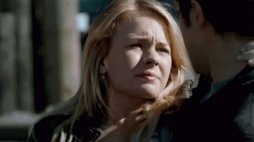 Man And Woman Looking At Each Other Sad Face GIF