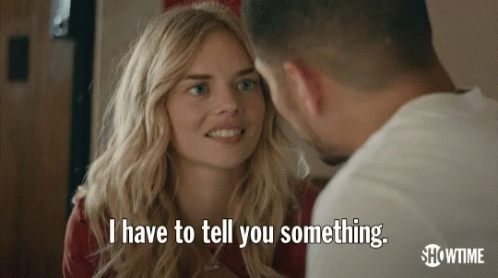 A Man And A Woman Are Looking At Each Other And The Woman Is Saying " I Have To Tell You Something " . GIF