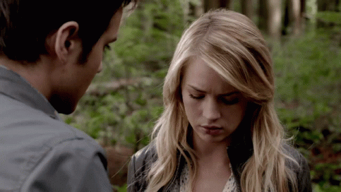 Man And Woman Looking At Each Other GIF