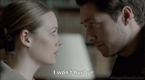 A Man And A Woman Are Looking At Each Other With The Caption I Won 'T Hurt Ye GIF