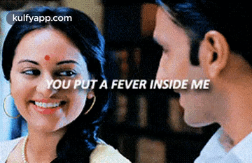 A Man And A Woman Are Looking At Each Other With The Words You Put A Fever Inside Me GIF