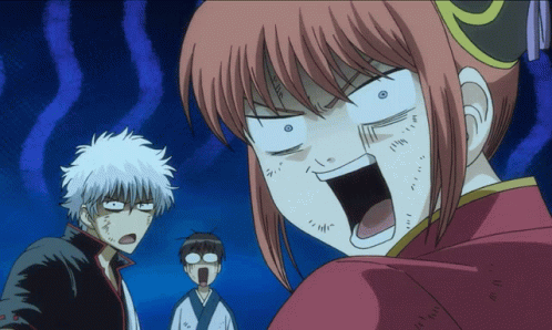 A Man And A Woman Are Making Funny Faces In A Cartoon GIF