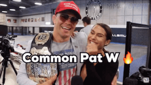 A Man And A Woman Are Posing For A Picture And The Caption Says Common Pat W. GIF