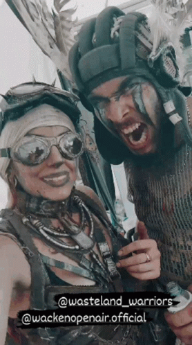 A Man And A Woman Are Posing For A Picture With The Words Wasteland Warriors At The Bottom GIF