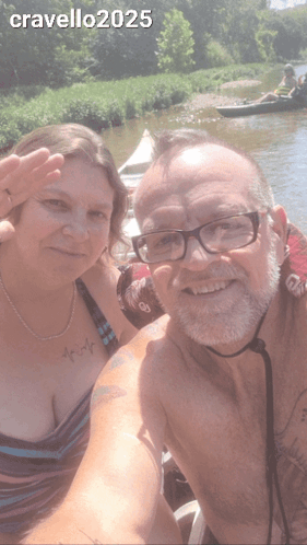 A Man And A Woman Are Posing For A Picture With The Year 2025 On The Bottom Right GIF