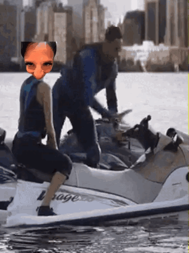 A Man And A Woman Are Riding A Jet Ski With The Word Rage On It GIF