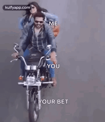 A Man And A Woman Are Riding A Motorcycle . GIF