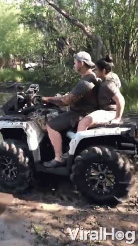 Man And Woman Riding ATV In Mud Viralhog Text GIF