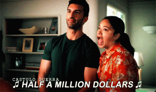 A Man And A Woman Are Singing Half A Million Dollars In A Room GIF