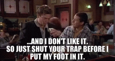 A Man And A Woman Are Sitting At A Table In A Restaurant With A Caption That Says And I Don T Like It GIF