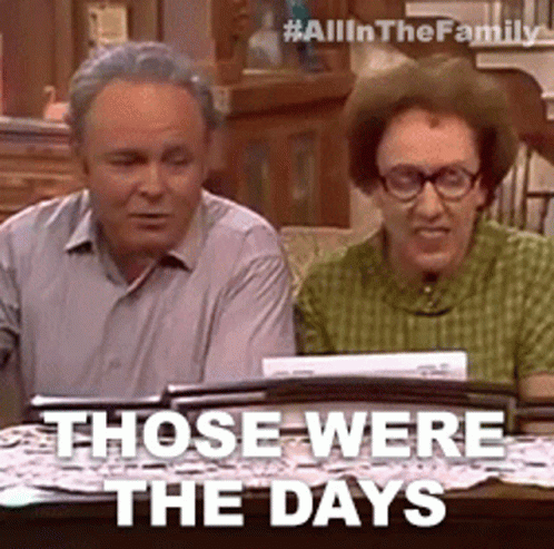Man And Woman Sitting With Words Those Were The Days GIF