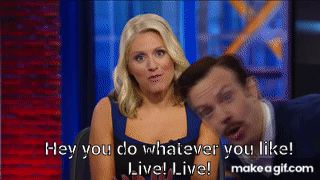A Man And A Woman Are Sitting Next To Each Other And The Woman Is Saying Hey You Do Whatever You Like GIF