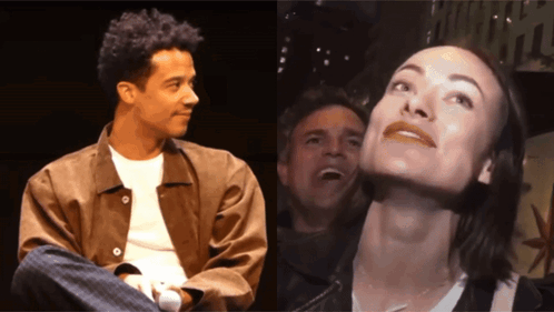 A Man And A Woman Are Sitting Next To Each Other And The Woman Is Smiling GIF