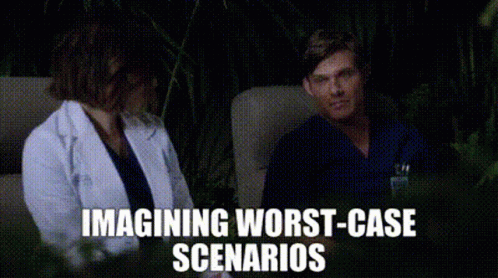 Man And Woman Sitting With Imagining Worst-Case Scenarios GIF