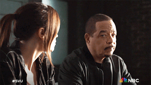 A Man And A Woman Are Sitting Next To Each Other With A Nbc Logo On The Bottom GIF