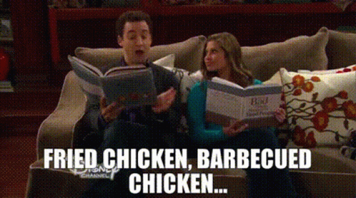 A Man And A Woman Are Sitting On A Couch Reading A Book And The Words Fried Chicken Barbecued Chicken Are Above Them GIF