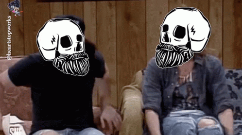 A Man And A Woman Are Sitting On A Couch With Skulls On Their Heads GIF