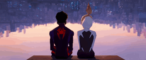A Man And A Woman Are Sitting On A Ledge Looking At The City Skyline GIF