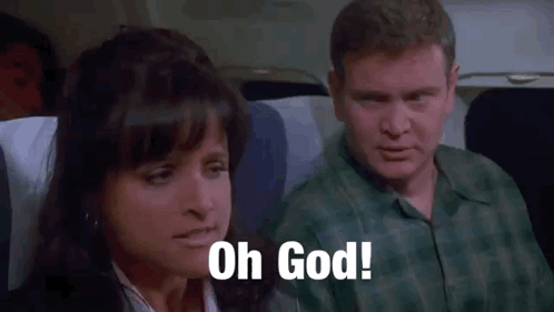 A Man And A Woman Are Sitting On An Airplane . GIF