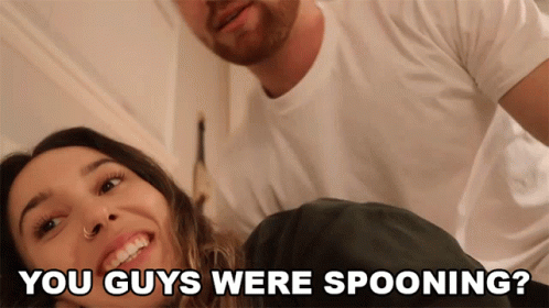 A Man And A Woman Are Smiling With The Words " You Guys Were Spooning " Below Them GIF