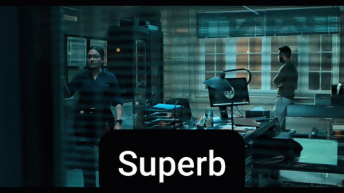 A Man And A Woman Are Standing In A Dark Room With The Word Superb In The Corner GIF