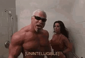 A Man And A Woman Are Standing In A Shower Together . GIF