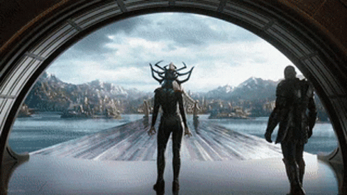 Man And Woman Standing By Lake Window GIF