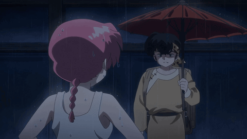 Man And Woman Standing In Rain With Umbrella GIF