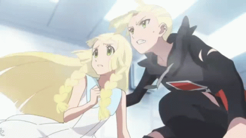 A Man And A Woman Are Standing Next To Each Other . GIF