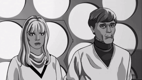 A Man And A Woman Are Standing Next To Each Other GIF