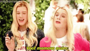 A Man And A Woman Are Standing Next To Each Other And One Of Them Is Talking In A Language Other Than English . GIF