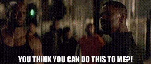 A Man And A Woman Are Standing Next To Each Other And The Man Is Asking The Woman If She Can Do Something To Him . GIF
