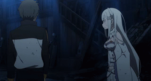 a man and a woman are standing next to each other and the man is holding the woman 's hand