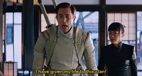 A Man And A Woman Are Standing Next To Each Other And The Man Is Saying " I Have Given My Life To This Clan " GIF
