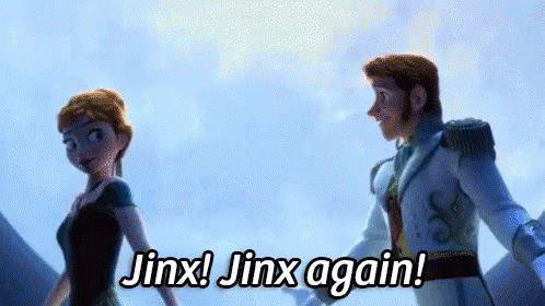 a man and a woman are standing next to each other and the man is saying jinx ! jinx again .