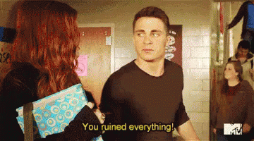 A Man And A Woman Are Standing Next To Each Other And The Man Is Saying You Ruined Everything GIF