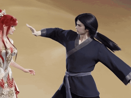 a man and a woman are standing next to each other and the man is wearing a black kimono