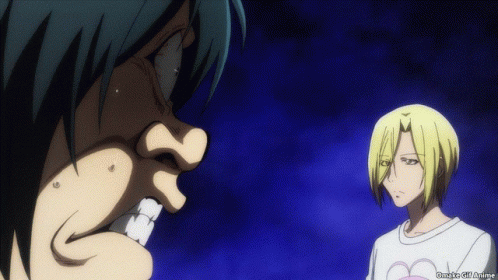 A Man And A Woman Are Standing Next To Each Other And The Man Is Wearing A White Shirt With A Heart On It .. GIF