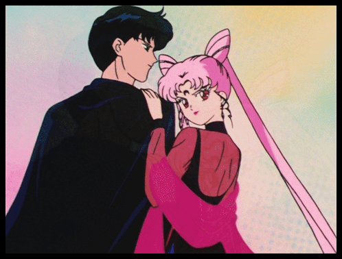 A Man And A Woman Are Standing Next To Each Other And The Woman Is Wearing A Pink Dress GIF