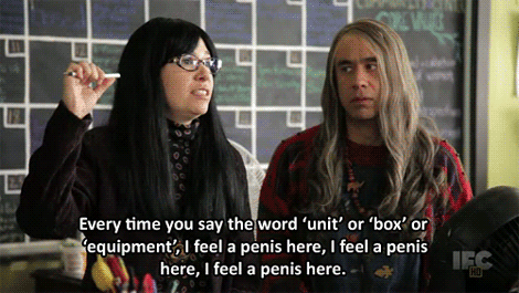 A Man And A Woman Are Standing Next To Each Other And The Woman Says Every Time You Say The Word Unit GIF