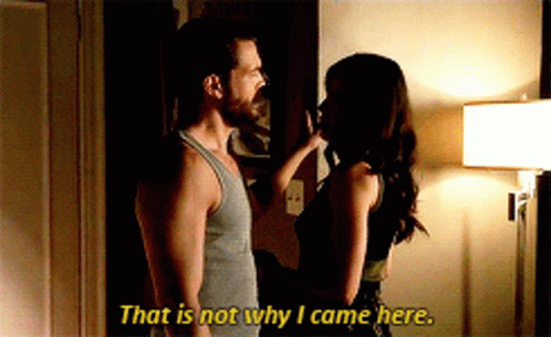 A Man And A Woman Are Standing Next To Each Other And The Woman Says That Is Not Why I Came Here GIF